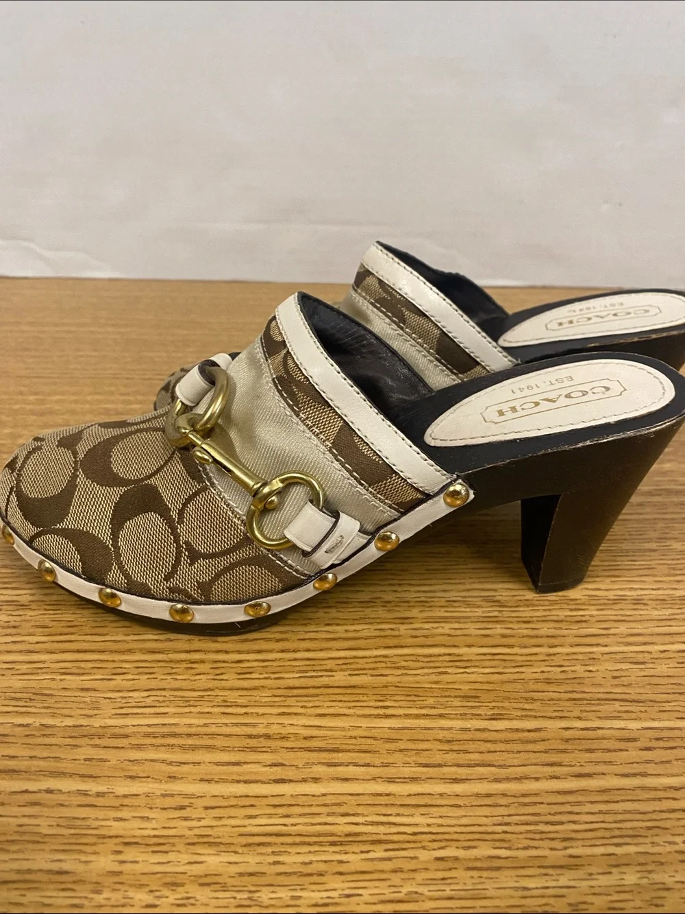 Coach slip mules